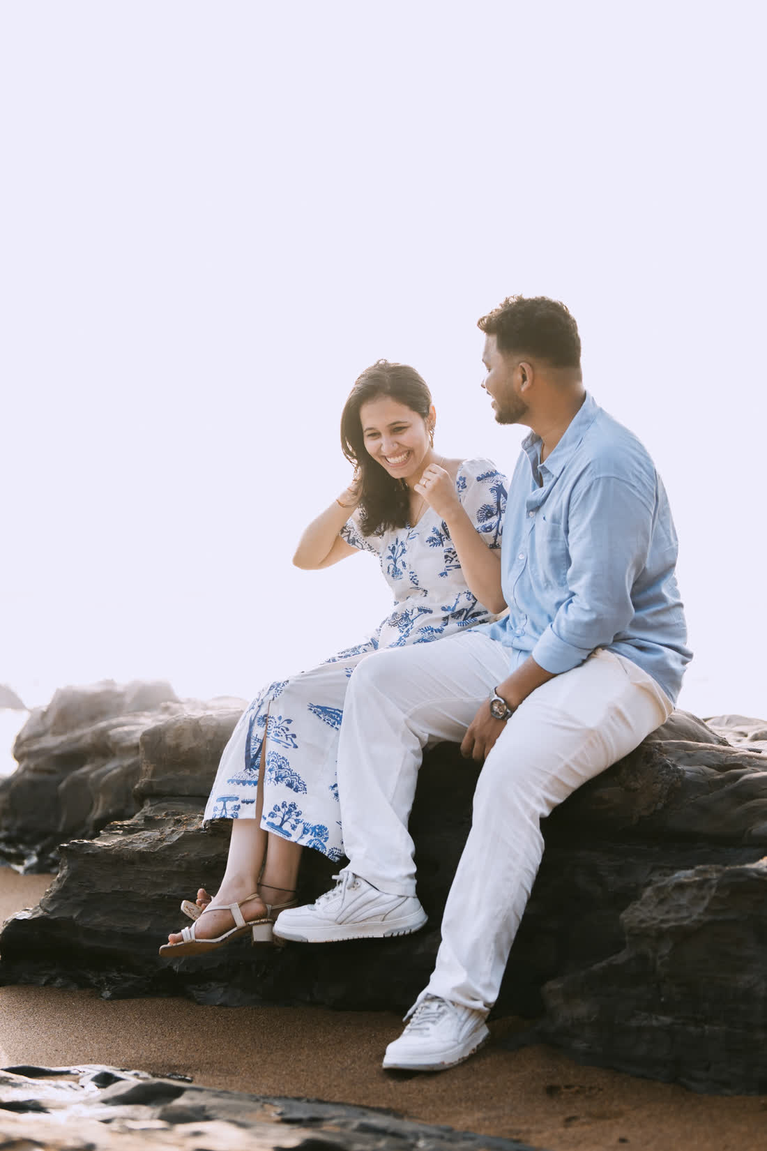 Rakshita and Rahul on the shore
