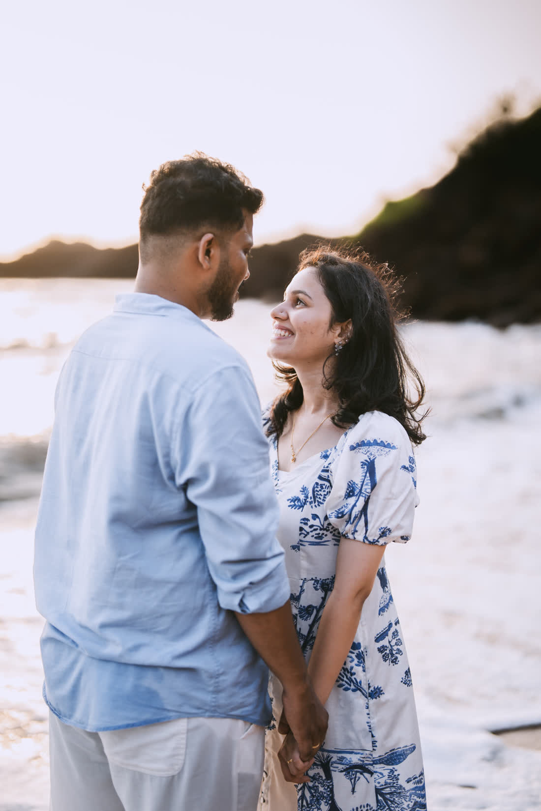 Rakshita and Rahul walking the beach